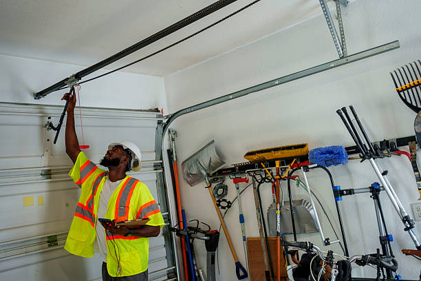 Professional Garage Door Panel Replacement technician working in Harper County County, OK
